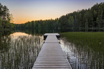 wooden bridge over lake