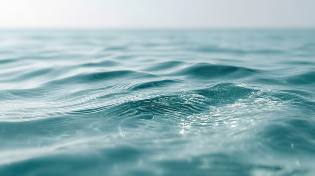 Rippling sea whispers under the sky's embrace, evoking World Oceans Day and tranquil introspection in azure serenity