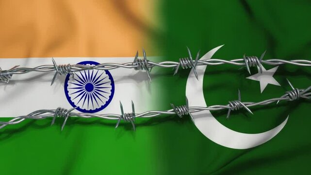 Flags of india and pakistan with barbed wire between them, symbol of border conflict, peace tension and political barrier