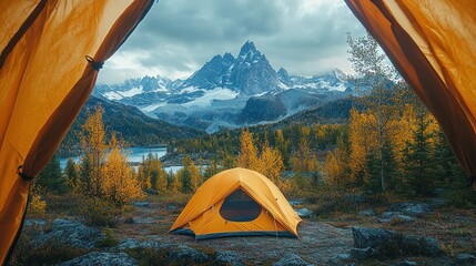 Camping tent in autumn mountain landscape