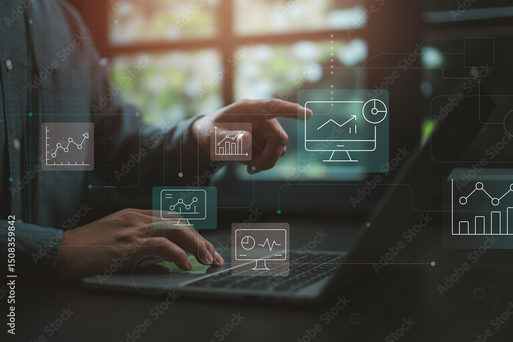 Poster businessman analyzing data dashboard with futuristic digital interface in modern office.