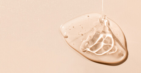 texture gel serum on beige background
