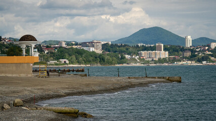 Panoramic View of Russian Coastal Town with Mountains and Modern Architecture by the Black Sea