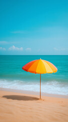 Colorful beach umbrella casting shade on golden sand