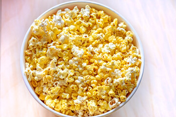 popcorn with cheese before watching a movie at the cinema. from above Family day out