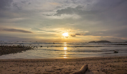 Beautiful sunset tropical beach with dramatic sky