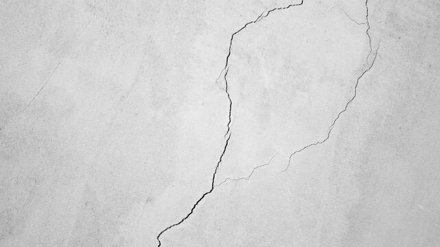 Cracked concrete wall, cracked foundation, damage. Crack on the wall texture. Cracked damaged wall. Cracked wall surface,animation
