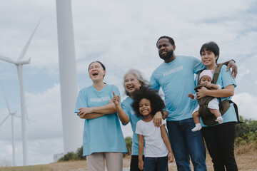 A family of different ages joins in an activity to love nature and the environment on World Day at...