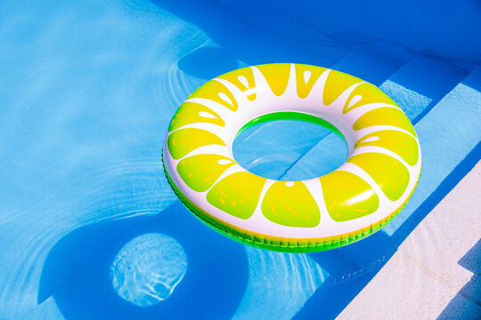 Colorful pool float in a sunny swimming pool