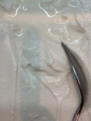 A spoonful of sour cream as a side dish