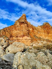 Fototapeta premium beauty of Bolata Beach, a hidden gem on the Black Sea coast of Bulgaria. Surrounded by red cliffs and calm turquoise waters