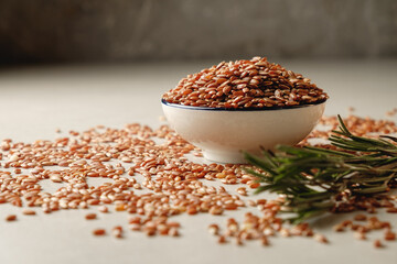 Organic brown rice captured in a rustic setting with natural elements
