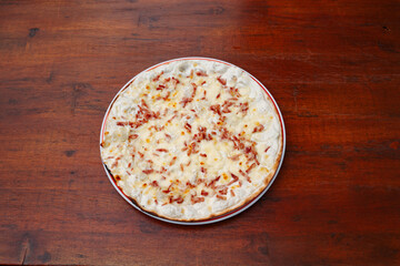 bacon and cream tarte flamee. Delicious freshly prepared meal, perfect for menus, restaurants, or food delivery concepts.
