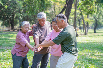 Retired men and women join forces to volunteer in the park to help and advise tourists, doing a...