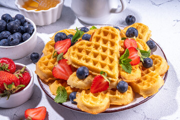 Breakfast belgian waffles with berry