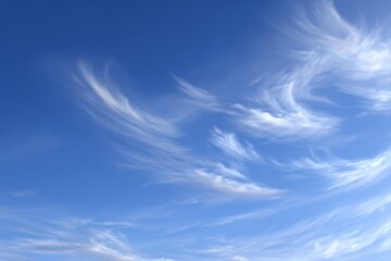Whimsical Cloud Formations Against a Vibrant Blue Sky