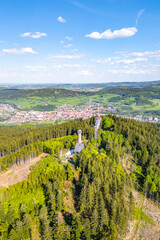 Svatobor Lookout Tower rises prominently over the valley, offering a stunning aerial view of Susice...