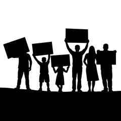 Group of people holding signs while standing together in silhouette  