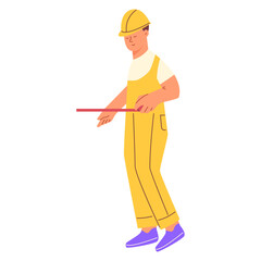 Male labourer uses a tape measure to measure the distance