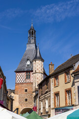 Obraz premium Saint Fargeau clock tower rising above Place de la Republique in Bourgogne Franche Comte, France