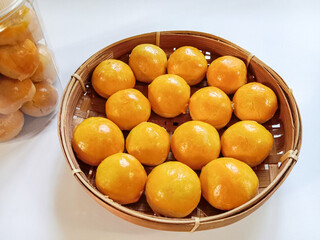 Nastar, Nastar Cookies or Pineapple tarts are small, bite-size tart filled with pineapple jam. Indonesian cookies popular during Eid Mubarak.