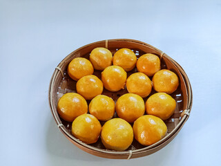 Nastar, Nastar Cookies or Pineapple tarts are small, bite-size tart filled with pineapple jam. Indonesian cookies popular during Eid Mubarak.