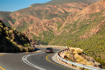 Ascending the Huis River Pass between Calitzdorp and Ladismith. The pass traverses the Huis River...