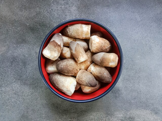Straw mushroom (Volvariella volvacea). Fresh straw mushrooms. Straw mushrooms for cooking. Food ingredients.