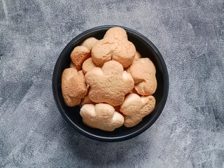 Kue Rintak or Rintak cake, is one of the traditional cake from Bangka Belitung. Made from sago flour, coconut milk and palm sugar. Bowl of cookies.