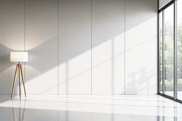 Minimalist interior with floor lamp and sunlight reflections on white wall.