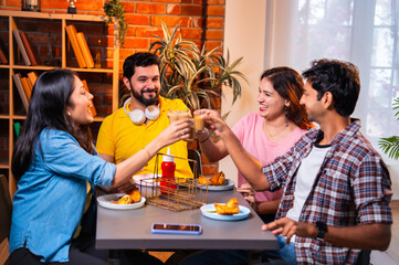 Indian youth bonding over tea, conversation in a relaxed cafe setting during a break from college
