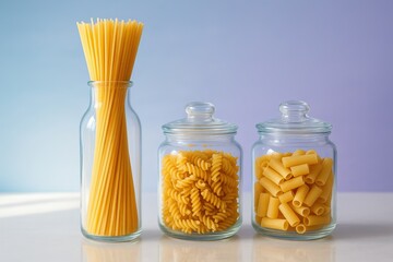 Assorted Pasta in Glass Jars showcases raw spaghetti, fusilli and rigatoni set against a bright background, ideal for illustrating Italian cuisine or pantry storage.