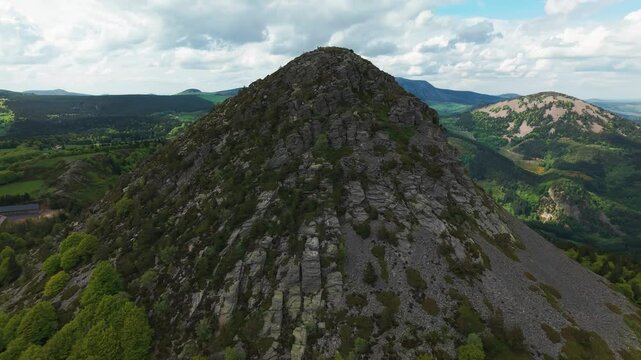 Aerial shot around the Mont Gerbier de Jonc, source of the Loire river, in Ardeche departement on an overcast day, Auvergne Rhone Alpes Region, France