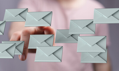 Close-up of a woman's finger selecting digital email messages.