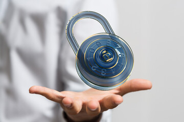 Secure your data! Stock photo of a hand holding a futuristic digital padlock, symbolizing online...