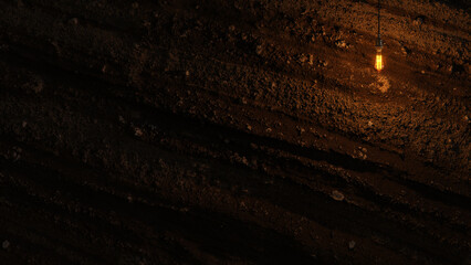 Dark Stone Wall with Edison lamp Lighting 3D Rendering