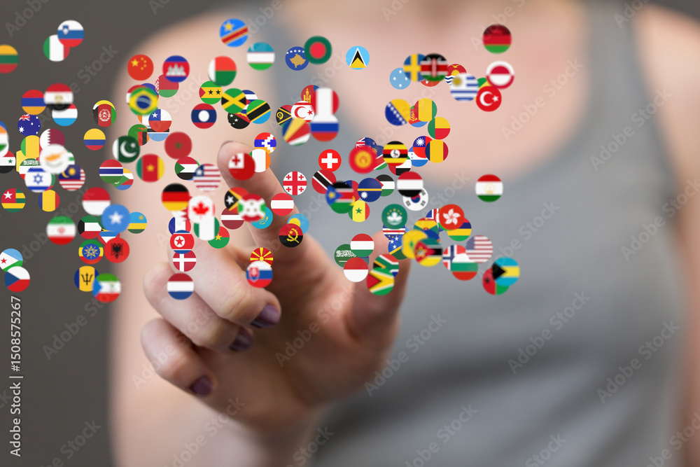 Leinwandbilder image of a hand interacting with floating flags representing global connection and international col