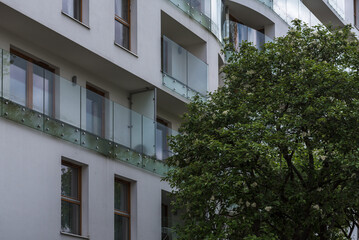 Obraz premium CITYSCAPE - Modern and stylish architecture of the apartment building in the dynamic city of Gdynia
