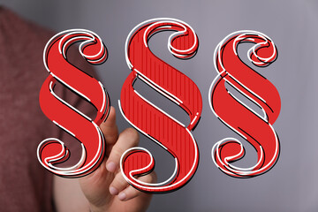 High-quality image of three 3D red paragraph symbols, perfect for legal and law-related projects.