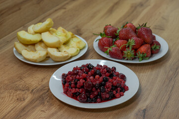 Fresh Strawberries and Mixed Fruits on Plates – Natural Food Ingredients

