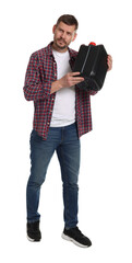 Man holding plastic canister on white background