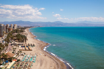 Aerial view of the coast of Malaga and the mediterranean sea on a Summer day	
