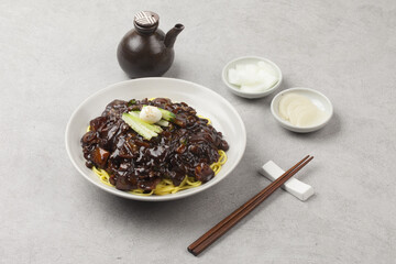  Ganjjajang is a Chinese dish. It is made by stir-frying with less water than jajangmyeon.
