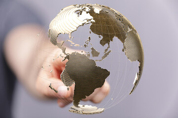 Abstract image of a hand interacting with a 3D model of the earth, symbolizing global connectivity...