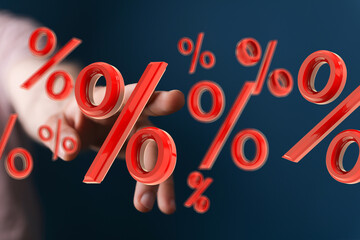 Attractive image depicting a hand interacting with floating percentage symbols, ideal for discount,...