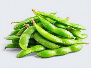 Fresh edamame pods, stacked high, showing bright green hues and texture details