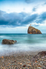Amazing view of the beach and rocks shot with a long exposure.