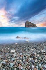 Amazing view of the beach and rocks shot with a long exposure.