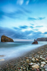 Amazing view of the beach and rocks shot with a long exposure.