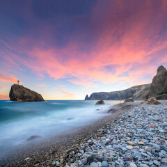 Amazing view of the beach and rocks shot with a long exposure.